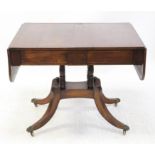 19th century mahogany and boxwood lined pedestal sofa table, the line inlaid top over two frieze