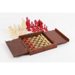 Barleycorn Red stained and natural bone chess set, and a miniature travelling set in wooden case on