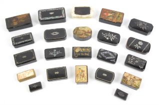 Collection of 19th century papier-mache snuff boxes, including one with a horse rider.