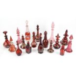 Collection of 19th century ruby and cranberry glass scent bottles, to include a large cut glass