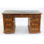 Victorian mahogany pedestal desk, the leather inset top above three frieze drawers on pedestals