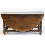 17th century style oak gateleg table, the later oval top on barley twist supports and double