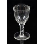 19th century drinking glass with engraved bowl on faceted stem and round foot, 19cm high,