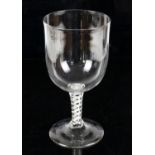 19th century large drinking glass with cotton twist stem on round foot, 24cm high,