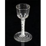 18th century cotton twist drinking glass with wavy form bowl, 14.5cm high,