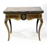 19th century French Boulle work foldover card table, the shaped top with foliate scroll design