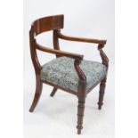 Pair of William IV mahogany carver dining chairs, with broad top rails and overstuffed seats on