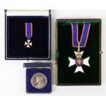 Medal and the miniature of a CVO medal, marked on reverse C748 and a Welsh Coin