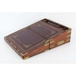 19th century brass bound mahogany writing box, the hinged top with inset shaped plaque,