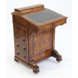 19th century marquetry inlaid davenport, the hinged compartment to top with fitted interior,