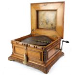 Oak cased Nicole Freres Polyphon, with 'Regina' movement numbered 33884, 39.5 (15 3/4 inch)