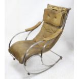 Steel frame rocking chair in the style of Peter Cooper for R.W. Winfield & Co, with leather
