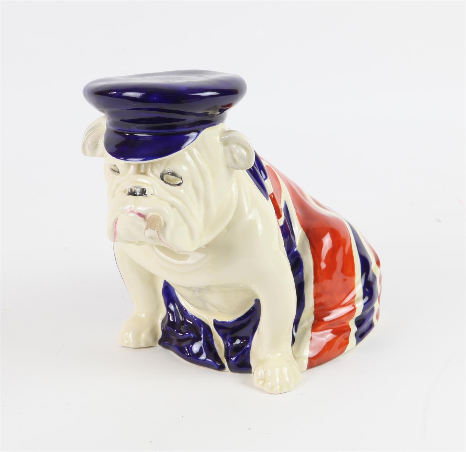 Royal Douton Winston Churchill Bull Dog wearing blue cap and draped in the union jack,