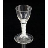 18th century cotton twist drinking glass on round foot, 12cm high,