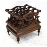 19th century rosewood three division Canterbury, with pierced floral divisions above frieze drawer