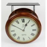 George V ceiling mounted double dial mahogany clock, the 12" dial with Royal Insignia and G.P.O.