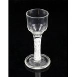 18th century cotton twist drinking glass on heavy round foot,