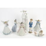 Three Lladro figures of angels, original boxes (nos. 5830, 5719 and 5831), a figure group of nuns
