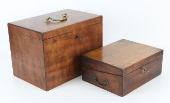 19th century mahogany box, the hinged lid with brass swing handle, enclosing an empty interior,