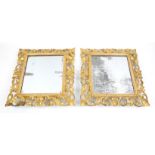 Pair of 19th century Italian style carved giltwood wall mirrors, the rectangular plates within