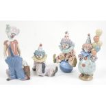 Four Lladro figures of clowns, numbered 5813, 6245, 5812, and 5811, in original boxes. (4)