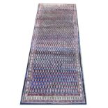 Persian Sarouk runner, with heavy pile blue ground and all over Sarouk Mir design, 312 x 115 cm
