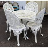 Set of four cast aluminium garden chairs and a circular table, Victorian style with acanthus leaf