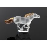 Lalique frosted glass model of a horse with gilt mane and tail, on clear glass base,