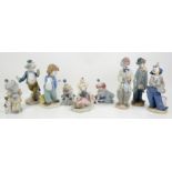 Five Lladro figures of clowns, tallest 23 cm high and four similar Nao figures (9)