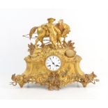 19th century French gilt metal mantel clock mounted with a figure of a boy and a horse over a