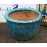 Large turquoise glazed terracotta planter, of baluster form, H41 diameter 64 cm