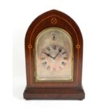 Late 19th century mahogany chiming lancet clock with silvered arched dial with Roman numerals and