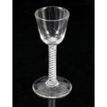 18th century air twist drinking glass on round foot, 15cm high,
