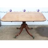 19th century mahogany tilt top breakfast table with crossbanded border on quatrefoil base and brass