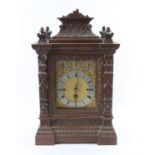 Victorian oak cased Westminster chime bracket clock, the silvered chapter ring with Roman and