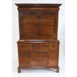 George I feather and crossbanded walnut secretaire abattant, moulded cornice over a cushion moulded