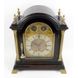 19th century ebonised bracket clock by Dent, 61 Strand, London, the domed case with brass finials