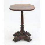 19th century rosewood occasional table, on possible associated support and ornately carved