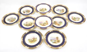 Eight Coalport hand painted plates, with gilt and underglaze blue borders, painted with scenes from