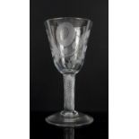 Large air-twist wine goblet, the bowl etched with thistle rose and moth, 21.5 cm high