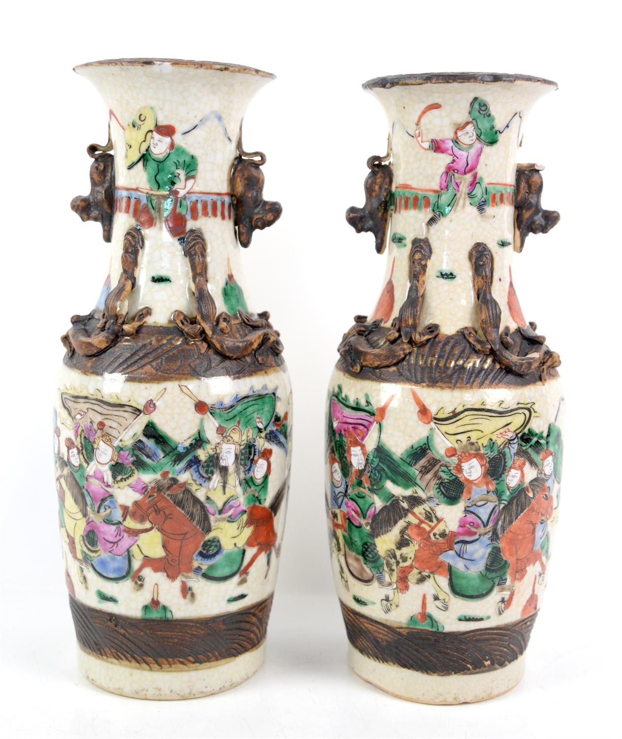 A pair of Famille verte  Nankin Vases, 19th century, painted with soldiers and horse riders,