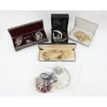 Costume jewellery, including, seven paste set rings, three are silver, with three faux pearl