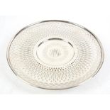 Lambert Bros pierced pedestal plate, the centre engraved with a monogram within a wreath,