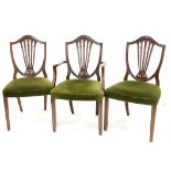 Set of eight George III style mahogany dining chairs, with shield backs, stuffover seats and