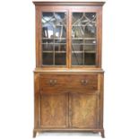 Early 19th century mahogany secretaire bookcase, the pair of glazed doors over a secretaire drawer
