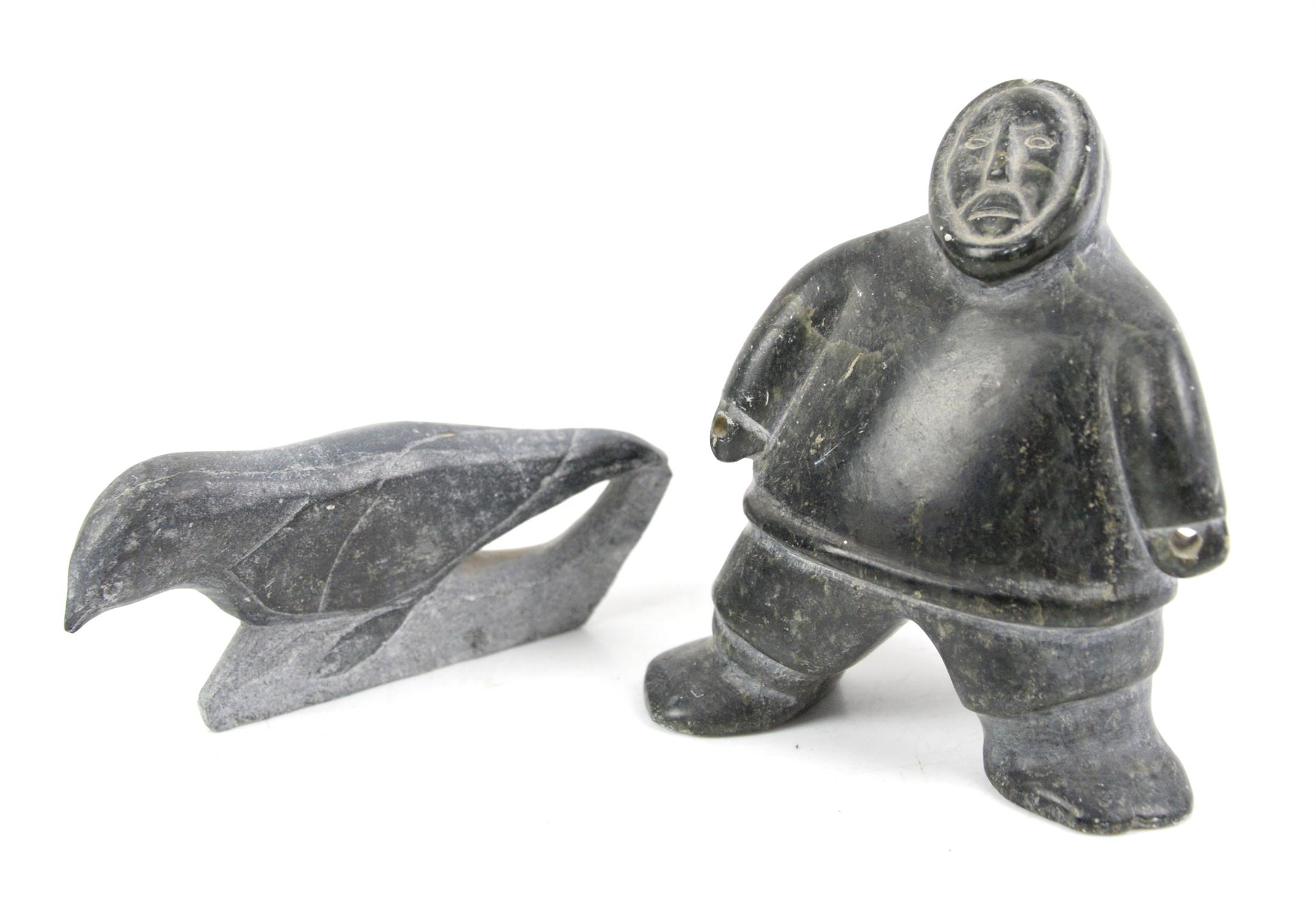 Canadian 'Eskimo Art' stone figure of an Eskimo, 12 cm high, and another of a bird,