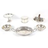 Silver plated tazza on three twist supports, marked Jacobean Plate, biscuit barrel,