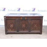 19th century oak triple panelled coffer, with moulded supports and later carved front,