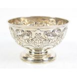 Silver repousse pedestal bowl, with lobed floral decoration, marks rubbed, partially removed