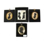A collection of four Victorian style silhouette portraits